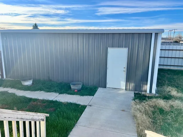 a view of backyard with green space