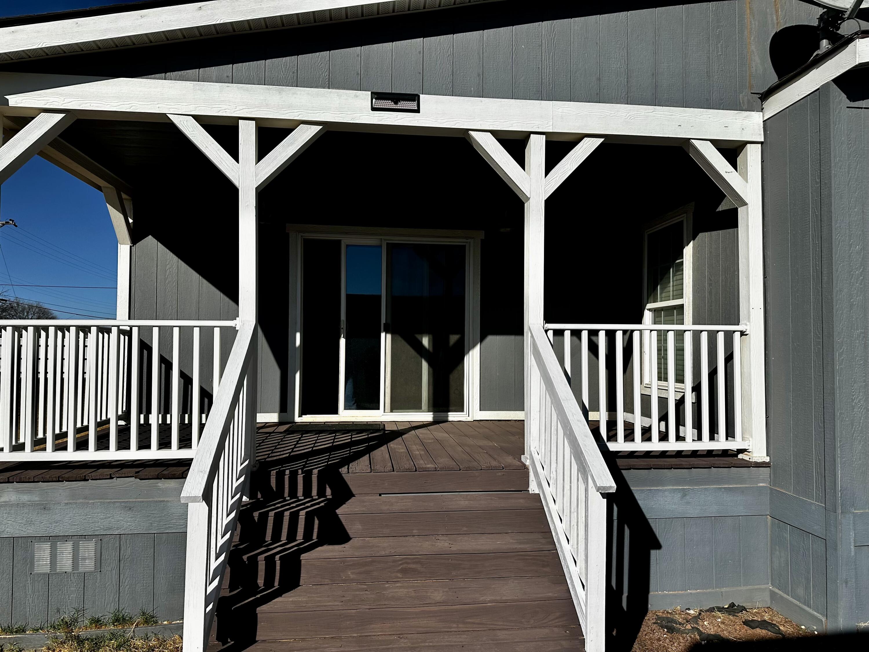 1021 Avenue North Ralls, TX 79357 - Photo 29 of 29 a view of a balcony with furniture and staircase