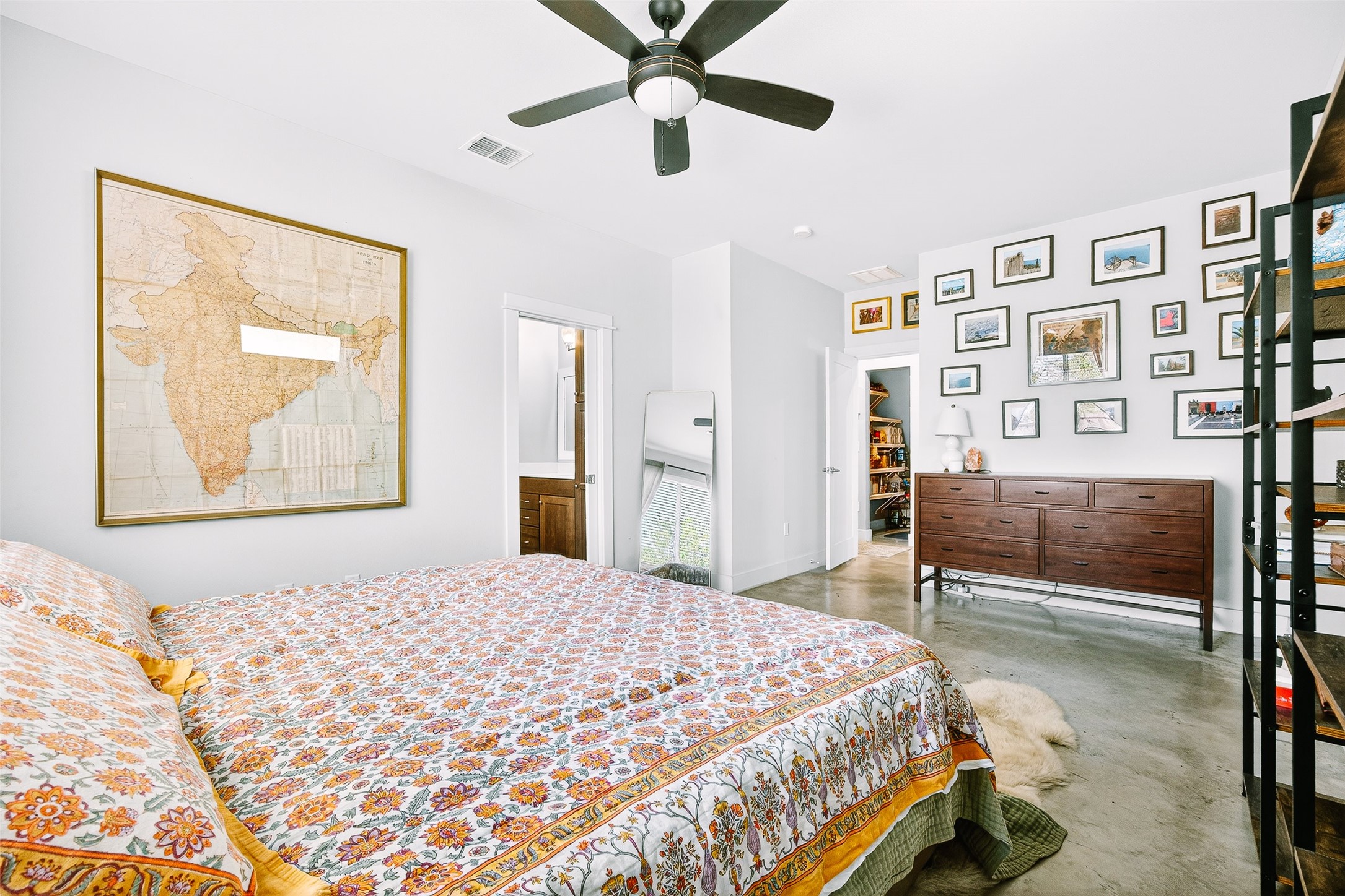 4917 Sunset Trail, Unit A Austin, TX 78745 - Photo 18 of 36 Bedroom with concrete flooring and ceiling fan