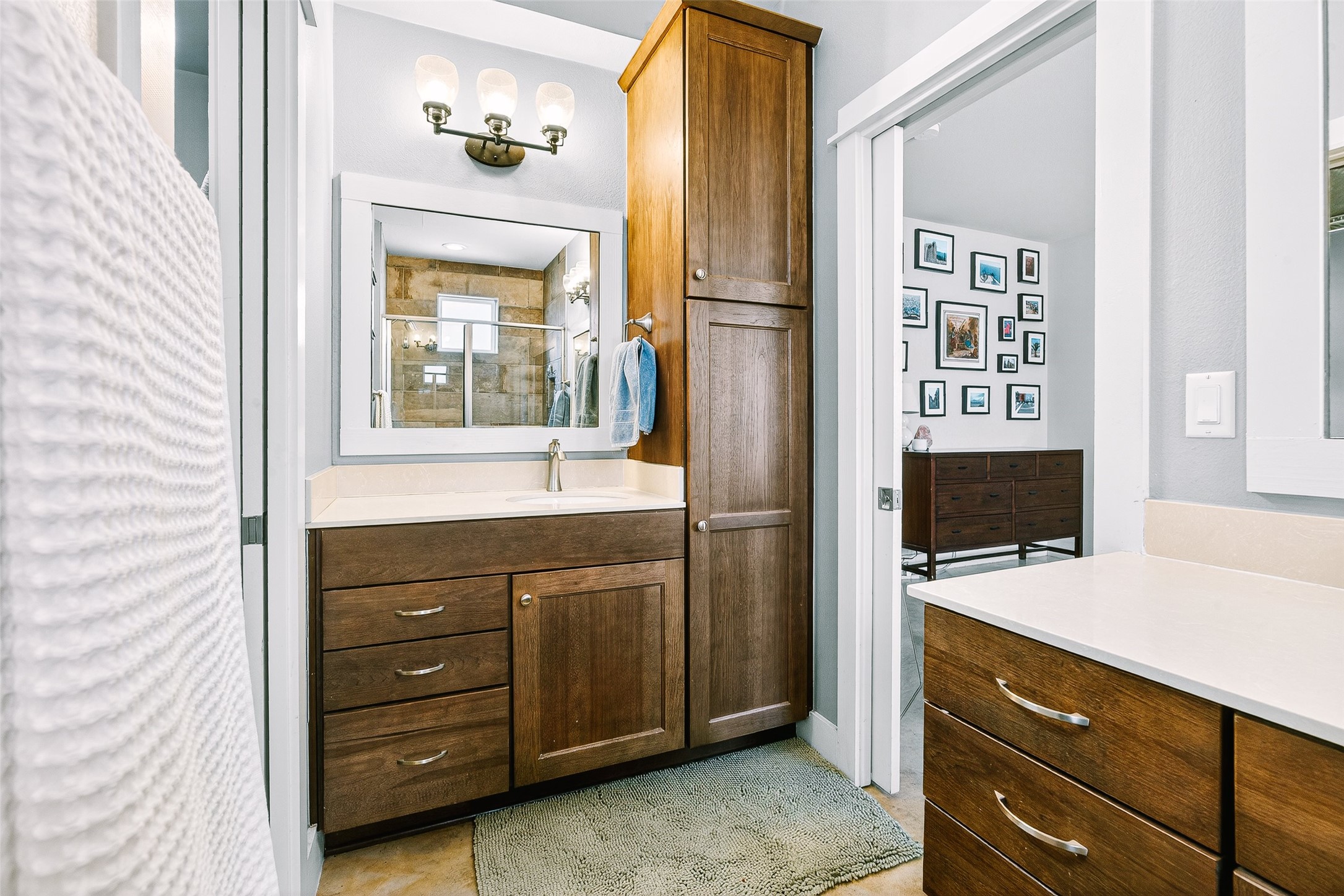 4917 Sunset Trail, Unit A Austin, TX 78745 - Photo 20 of 36 Bathroom with vanity and a stall shower