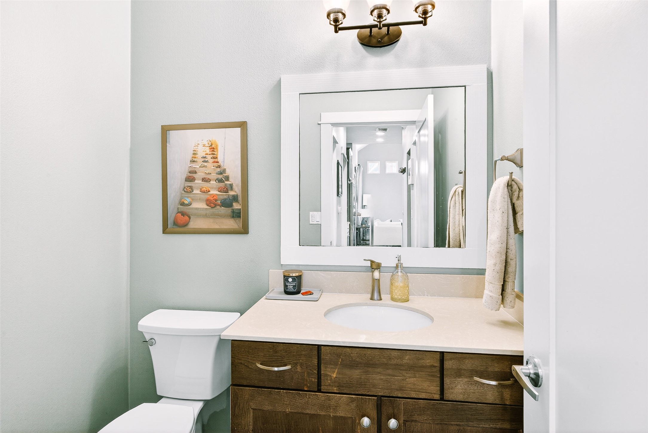4917 Sunset Trail, Unit A Austin, TX 78745 - Photo 23 of 36 Half bathroom featuring toilet and vanity