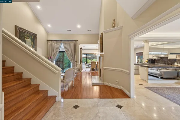 a view of a living room and a livingroom with furniture