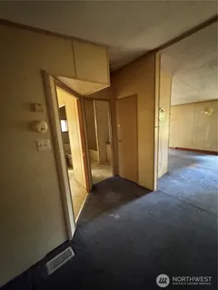 a view of an empty room and window