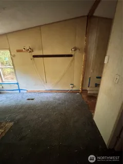 a view of a hallway with entryway