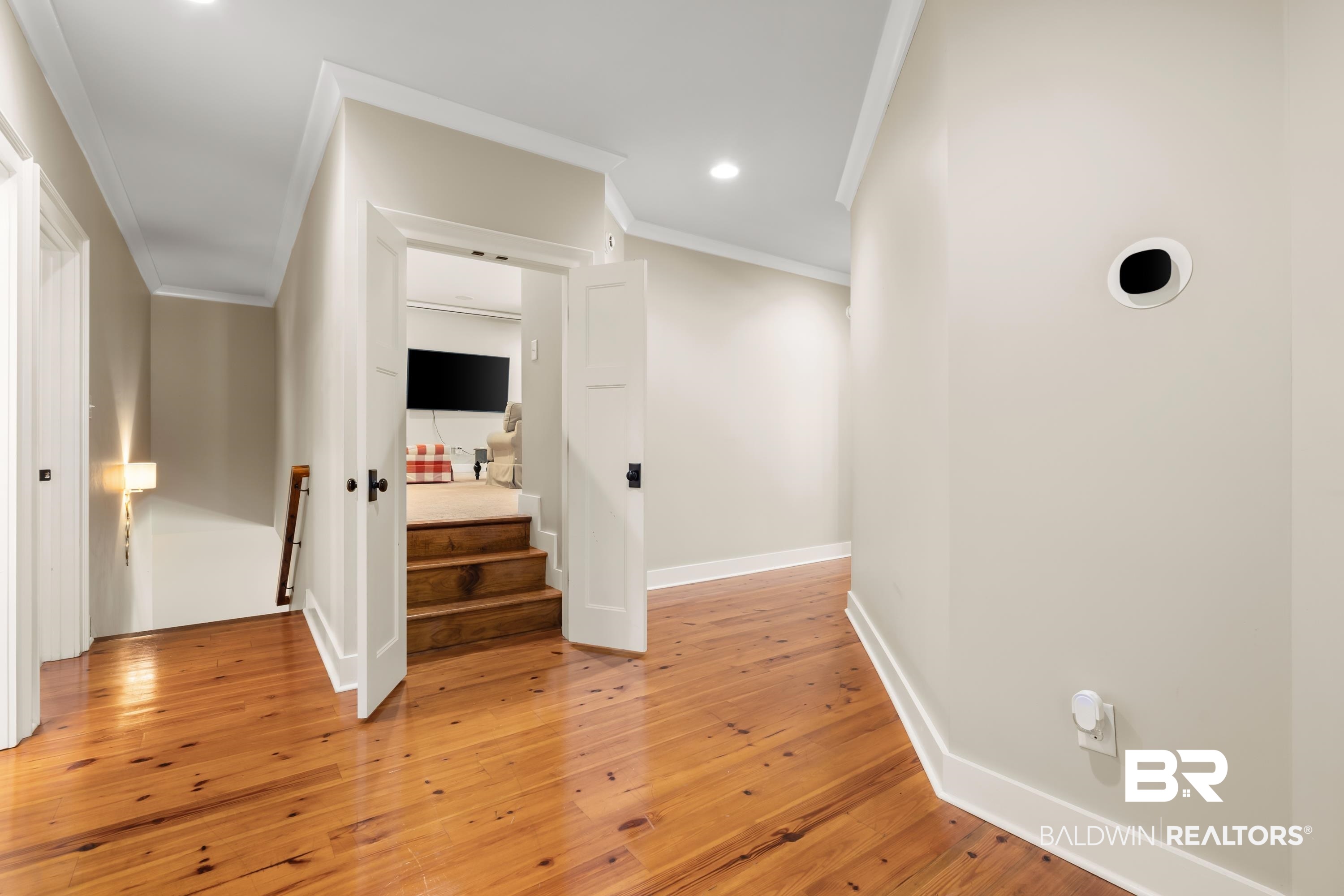 30057 Dolive Ridge Daphne, AL 36527 - Photo 31 of 55 Hallway featuring crown molding and hardwood / wood-style floors