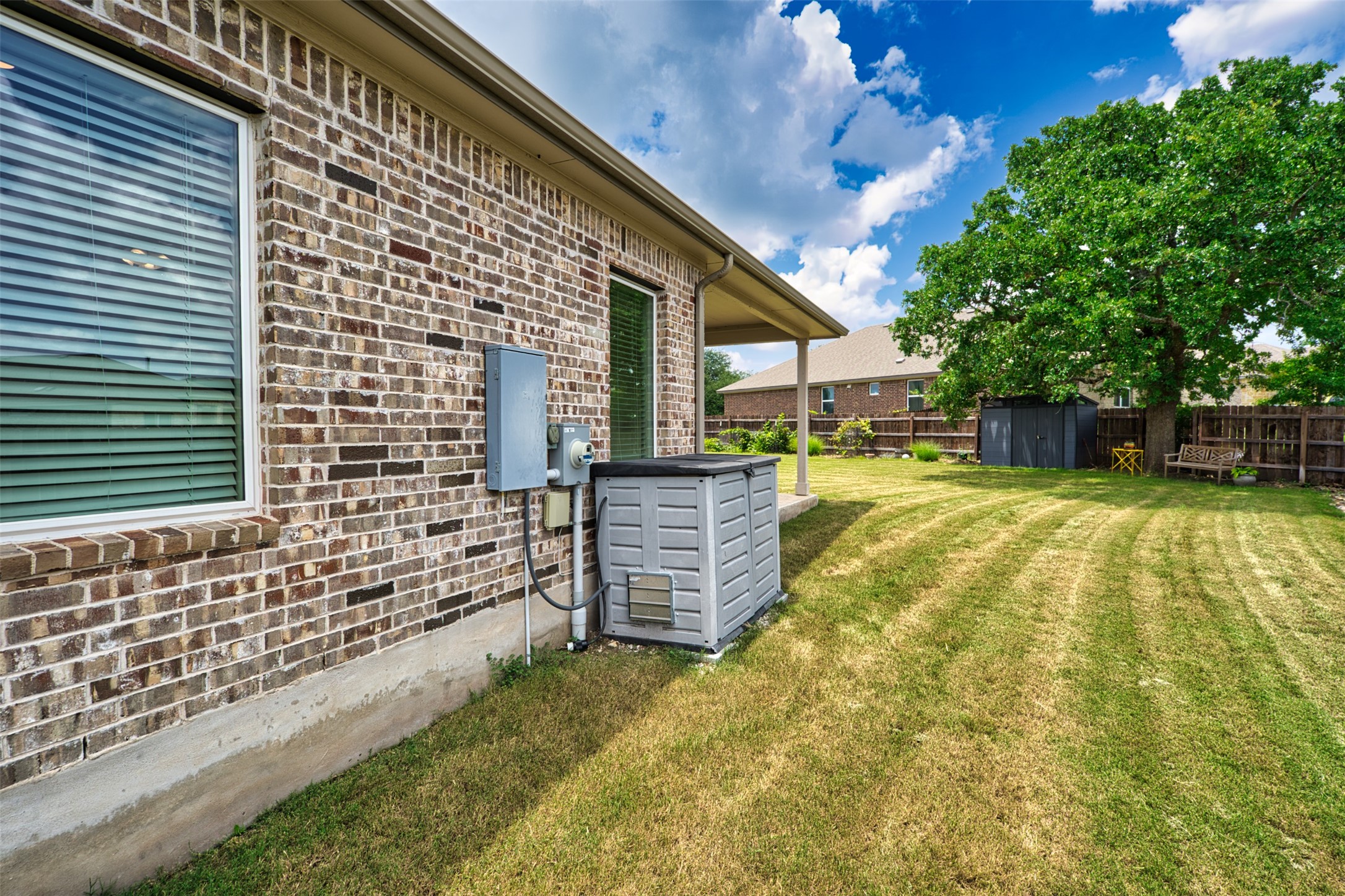 4125 Buffalo Ford Road Georgetown, TX 78628 - Photo 22 of 28 View of yard featuring a storage shed