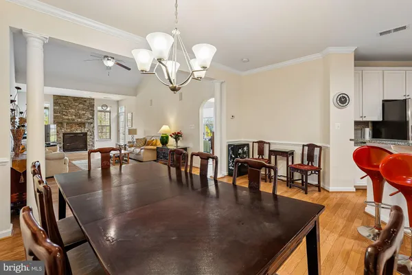 a kitchen with granite countertop a stove and a microwave