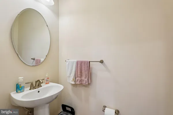 a bedroom with a bed dresser and a flat screen tv