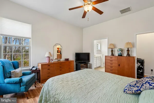 a view of a livingroom with furniture and a flat screen tv