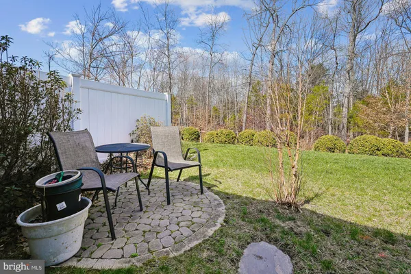 a view of a lake with a house in the background