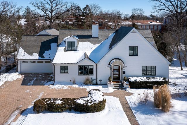 a front view of a house with yard