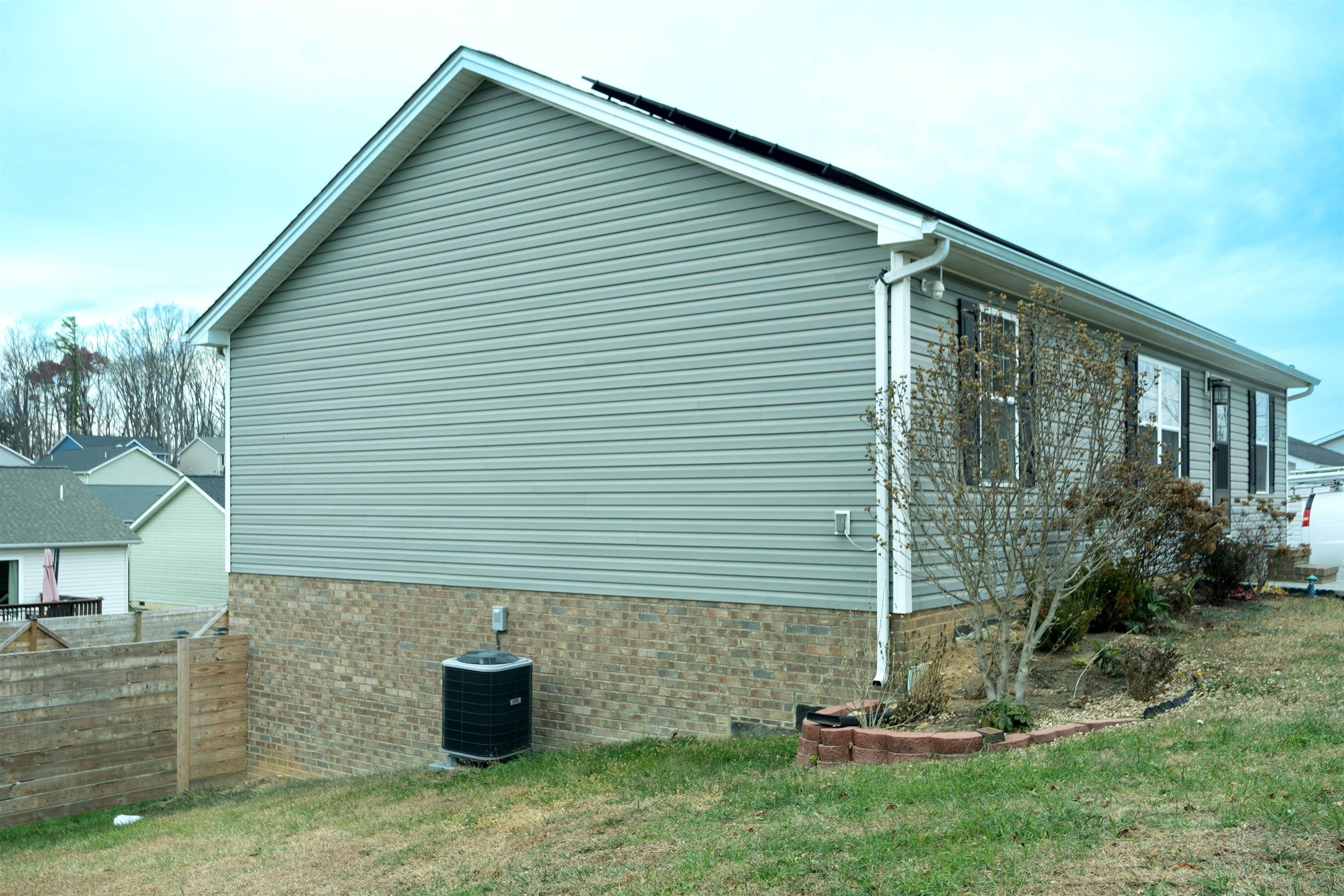 1771 Marble Ridge Drive Harrisonburg, VA 22801 - Photo 5 of 49 a front view of a house with garden