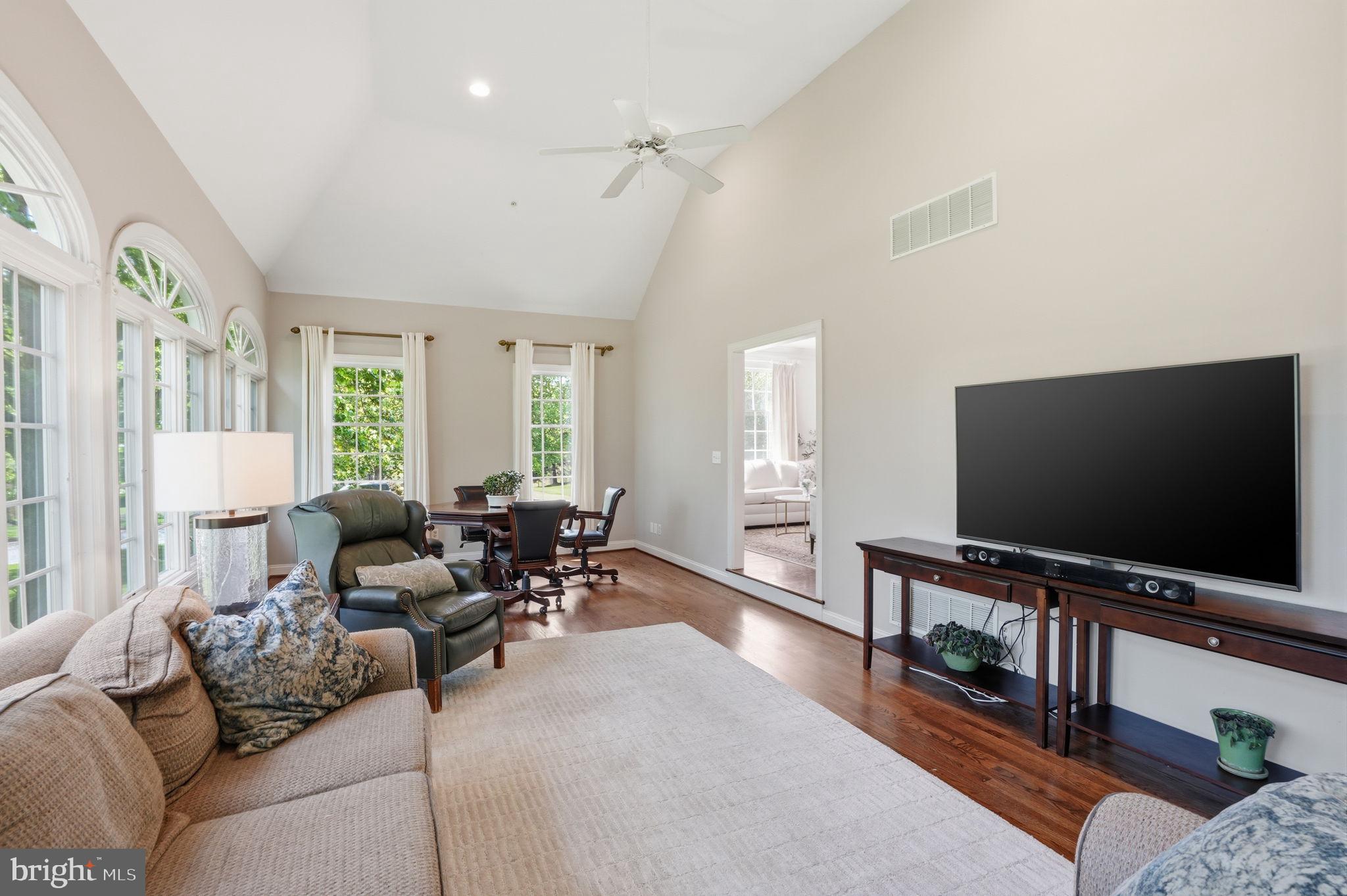 53 Alexanders Court Newtown, PA 18940 - Photo 20 of 61 a living room with furniture and a flat screen tv
