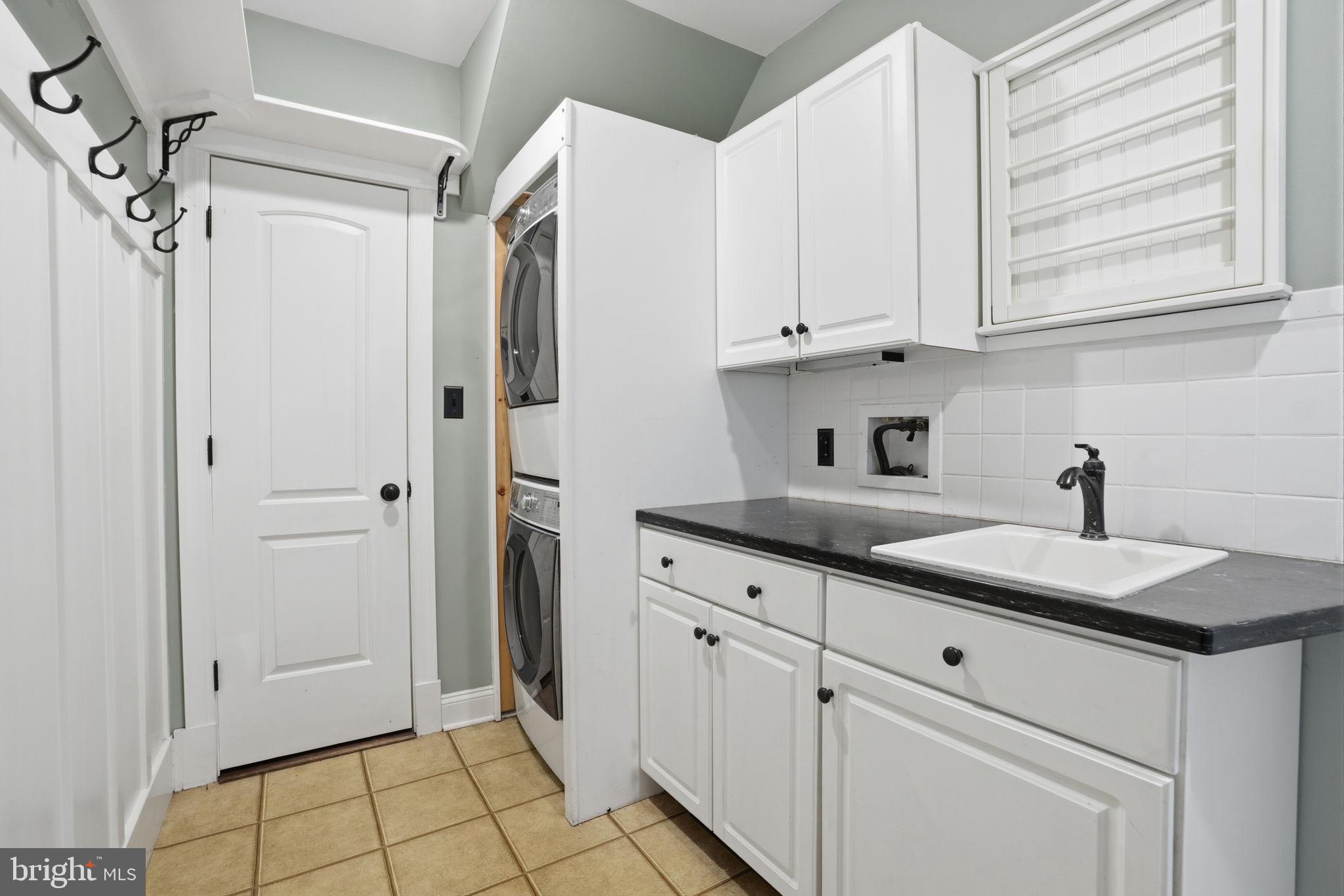 53 Alexanders Court Newtown, PA 18940 - Photo 23 of 61 a kitchen with appliances cabinets and a sink