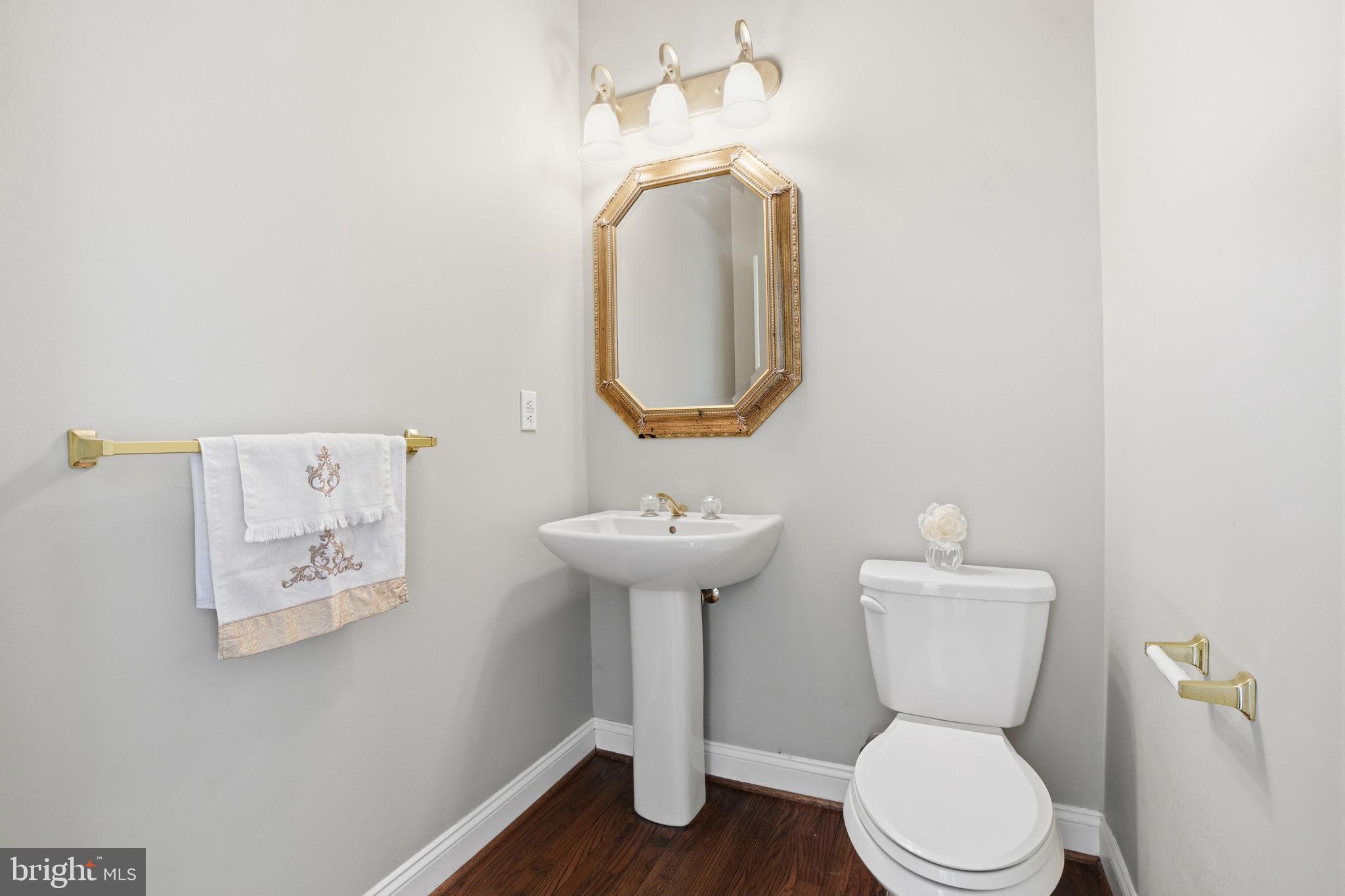 53 Alexanders Court Newtown, PA 18940 - Photo 24 of 61 a bathroom with a toilet sink and mirror