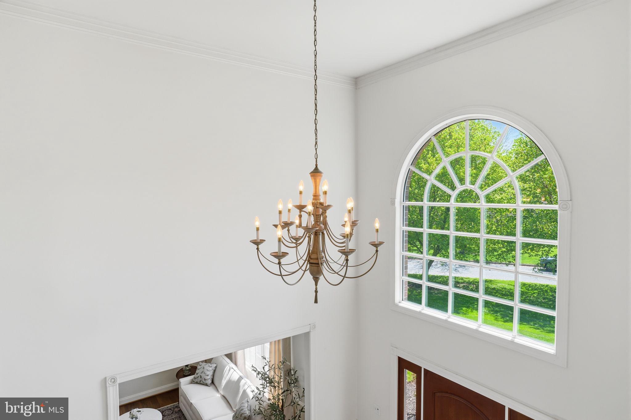 53 Alexanders Court Newtown, PA 18940 - Photo 41 of 61 a view of a room with window and a chandelier