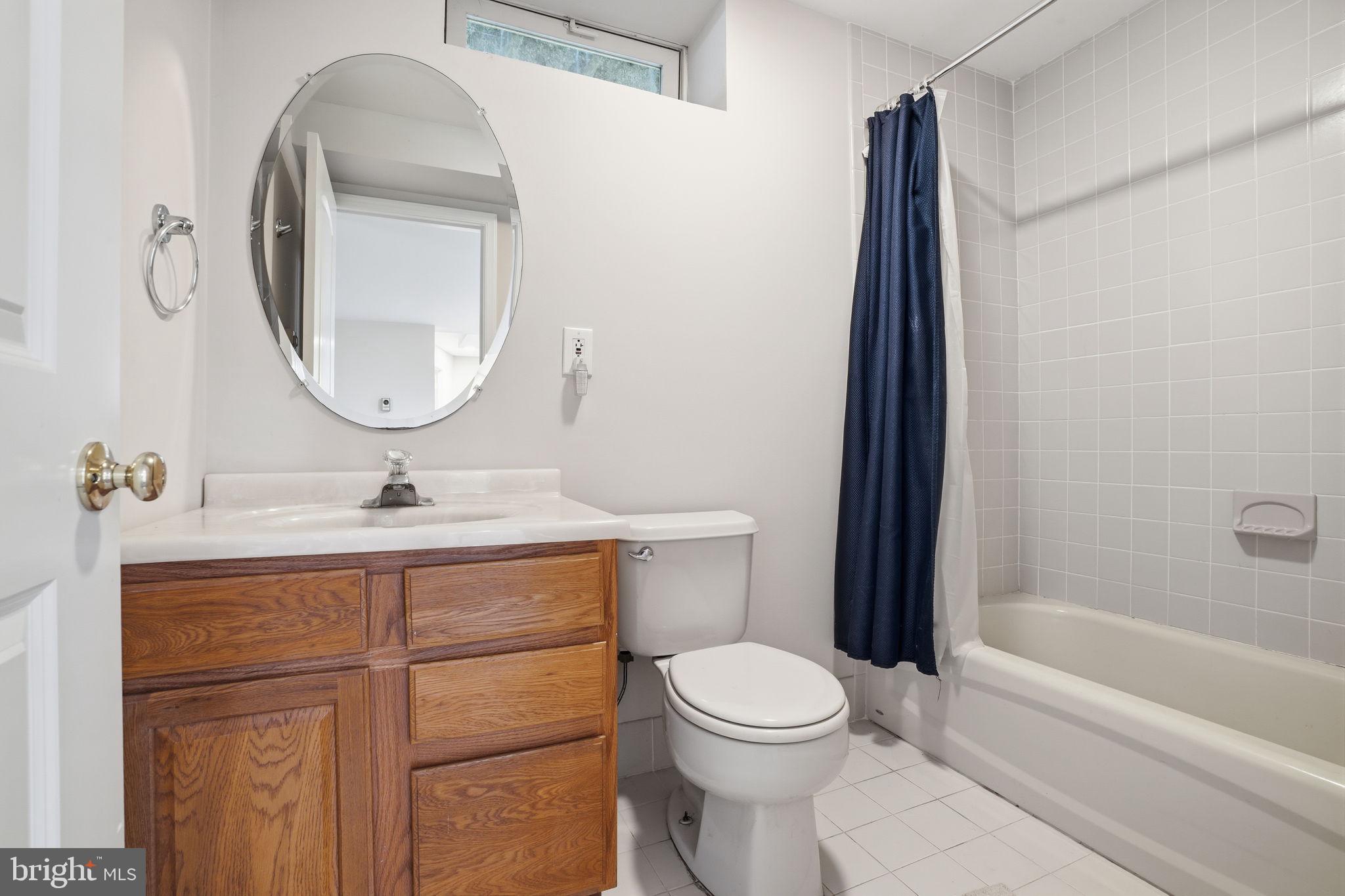 53 Alexanders Court Newtown, PA 18940 - Photo 44 of 61 a bathroom with a toilet sink and mirror