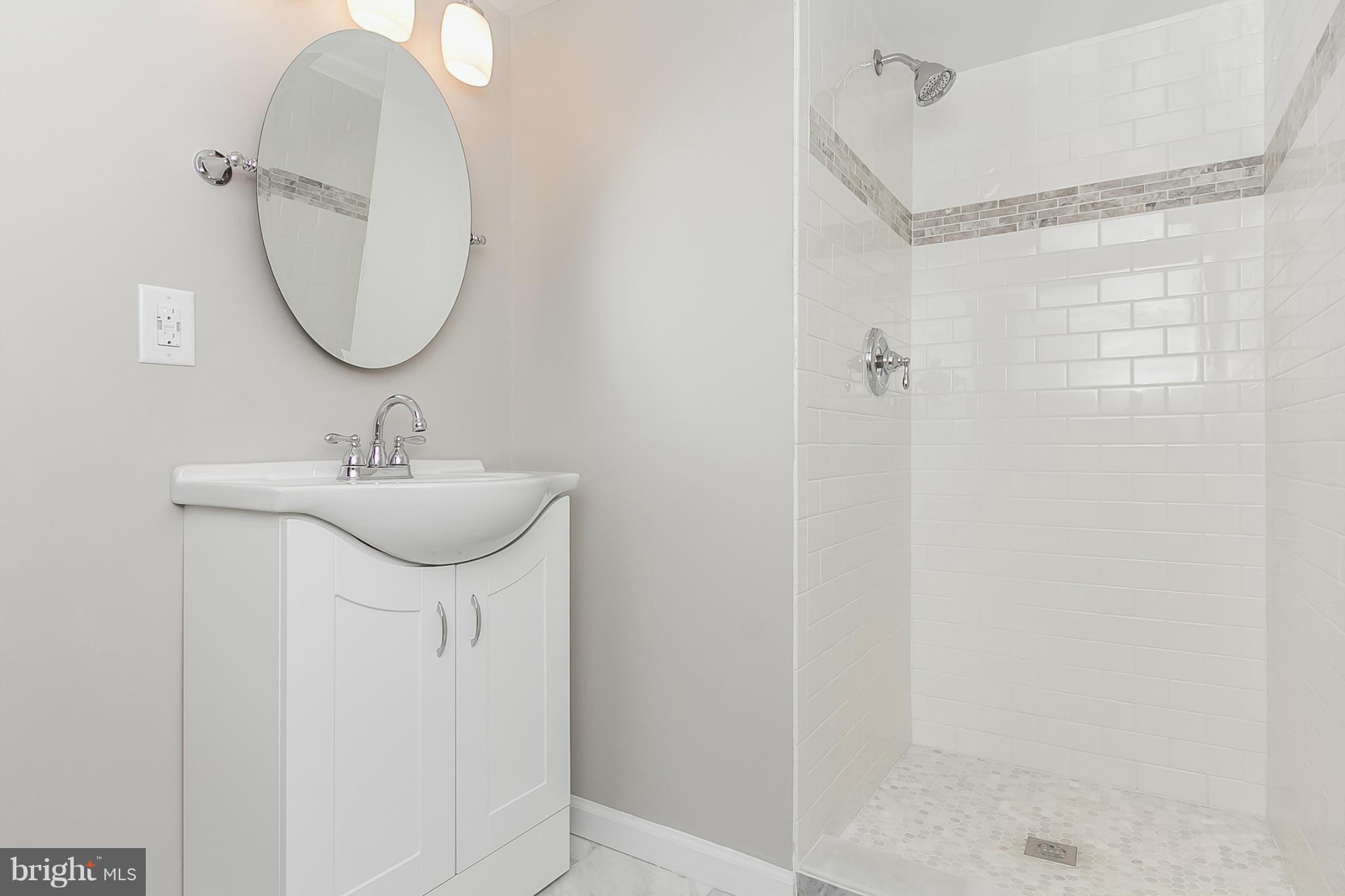 8502 Pleasant Plains Road Towson, MD 21286 - Photo 22 of 26 Marble tiled full bath