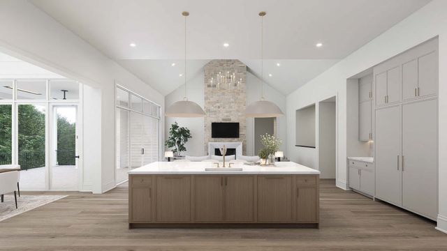 a view of living room with kitchen island furniture and fireplace