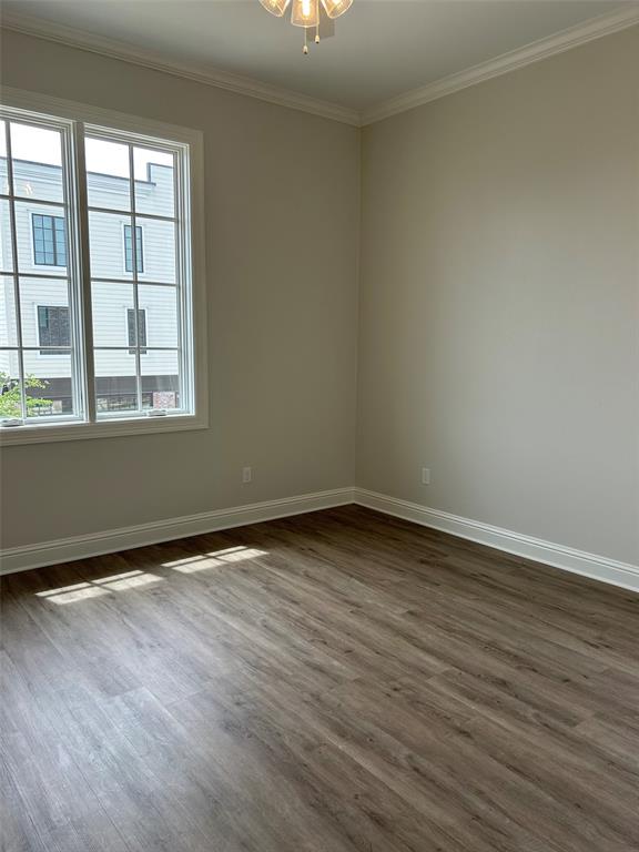 1946 Chestnut Pk Lane Shreveport, LA 71106 - Photo 12 of 23 Empty room with crown molding and dark wood finished floors