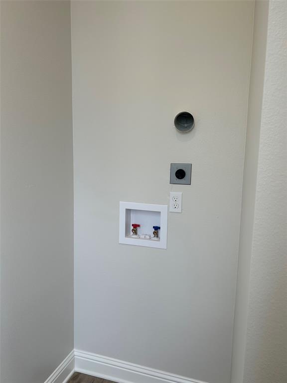 1946 Chestnut Pk Lane Shreveport, LA 71106 - Photo 15 of 23 Laundry area with hookup for an electric dryer, hookup for a washing machine, and dark wood-style floors