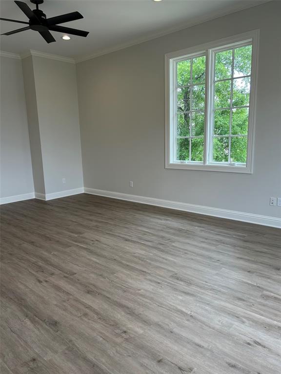 1946 Chestnut Pk Lane Shreveport, LA 71106 - Photo 17 of 23 Living dining area featuring crown molding, wood finished floors, recessed lighting, and ceiling fan