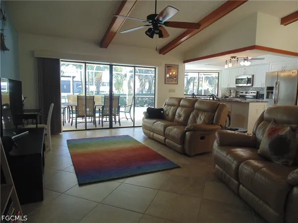 a living room with furniture and a table