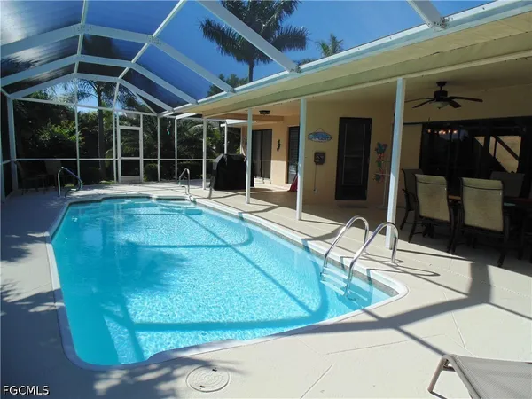 a view of a backyard with a patio