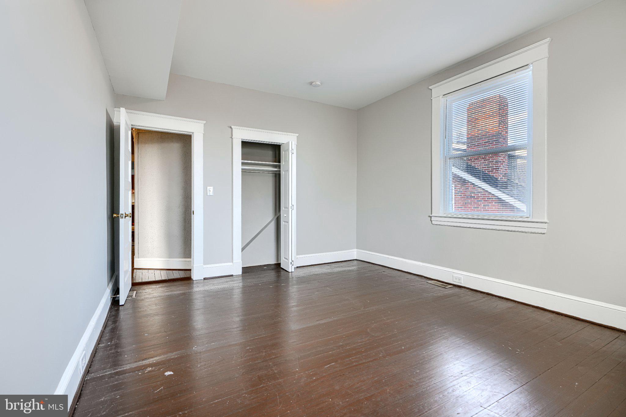 3414 Alto Road, Unit 2 Baltimore, MD 21216 - Photo 16 of 26 Spacious room with natural light.