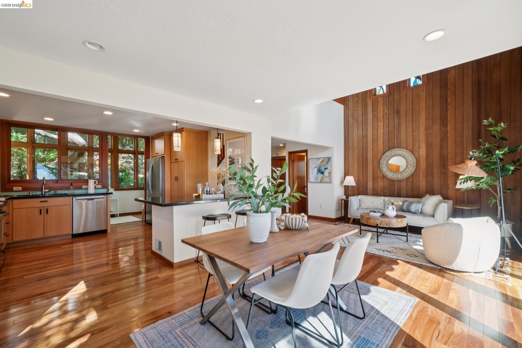 1183 Keeler Avenue Berkeley, CA 94708 - Photo 20 of 53 Dining space with wooden walls, dark wood finished floors, and recessed lighting