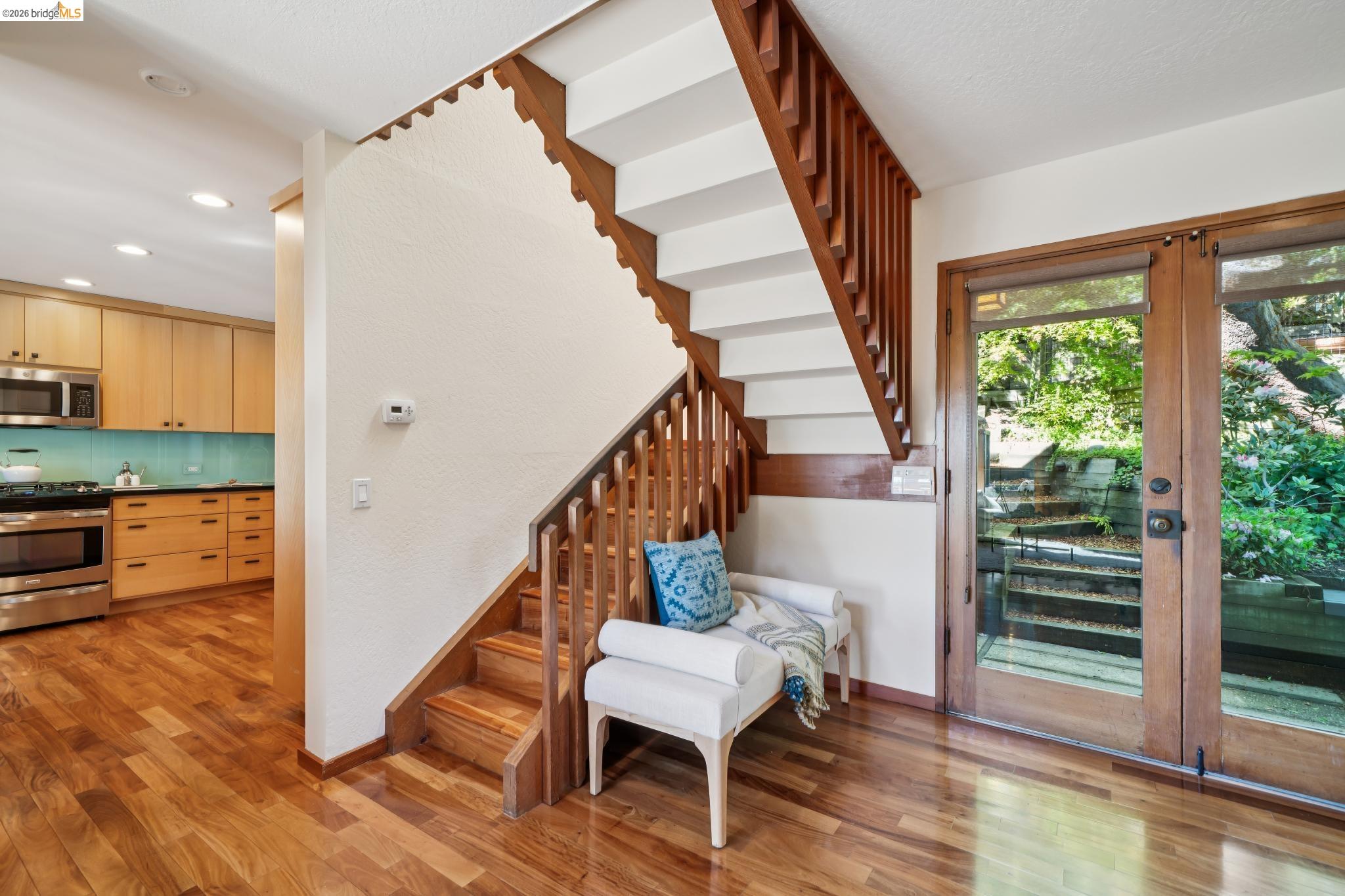 1183 Keeler Avenue Berkeley, CA 94708 - Photo 30 of 53 Stairway with wood finished floors and baseboards