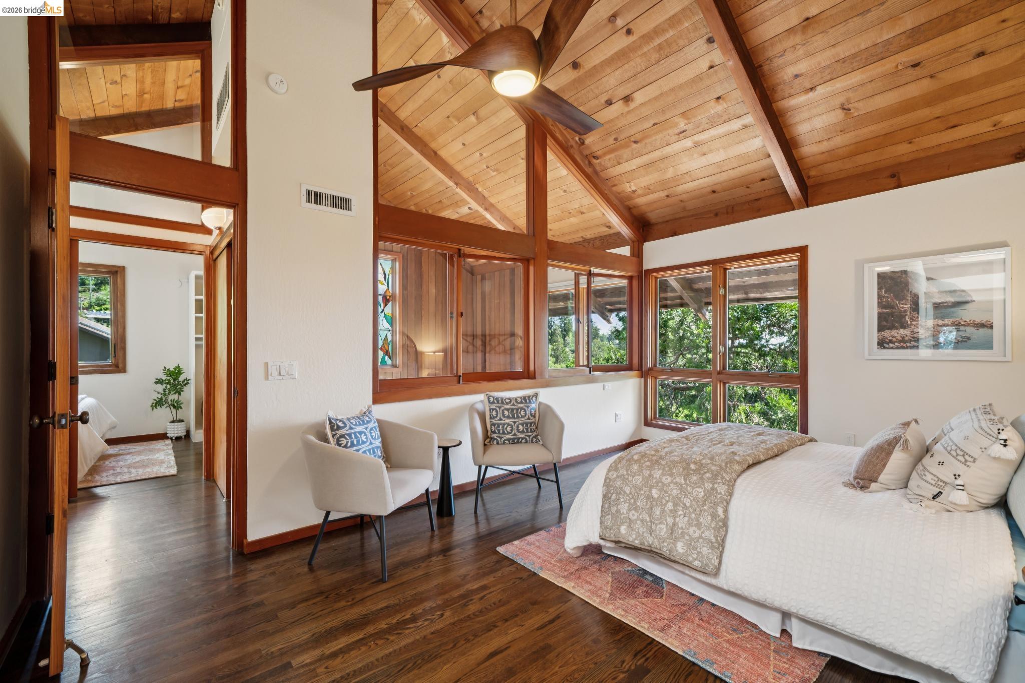 1183 Keeler Avenue Berkeley, CA 94708 - Photo 33 of 53 Bedroom with dark wood finished floors, a high wooden beamed ceiling, multiple windows, and ceiling fan