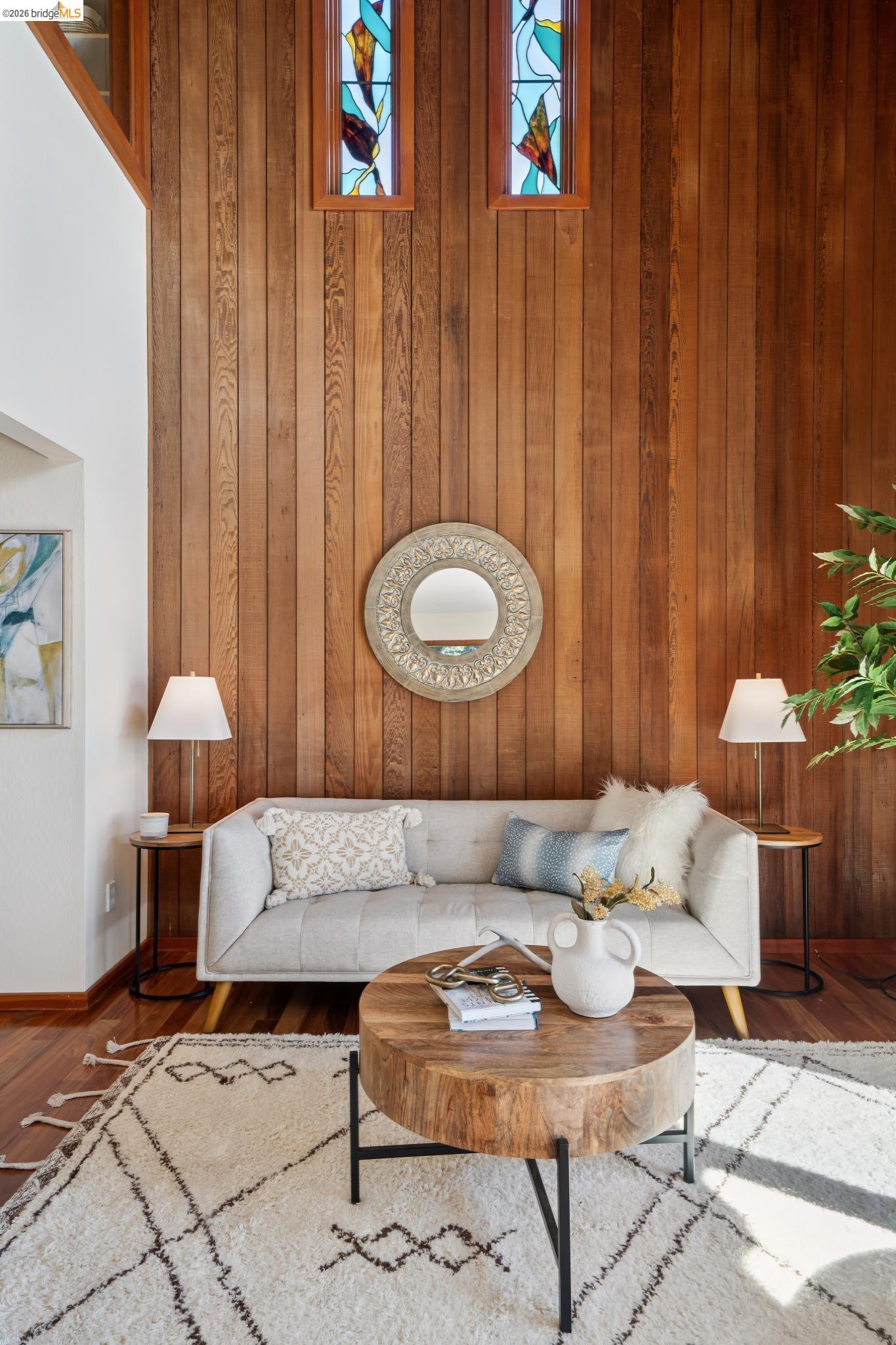 1183 Keeler Avenue Berkeley, CA 94708 - Photo 8 of 53 Living room featuring wood finished floors and wooden walls