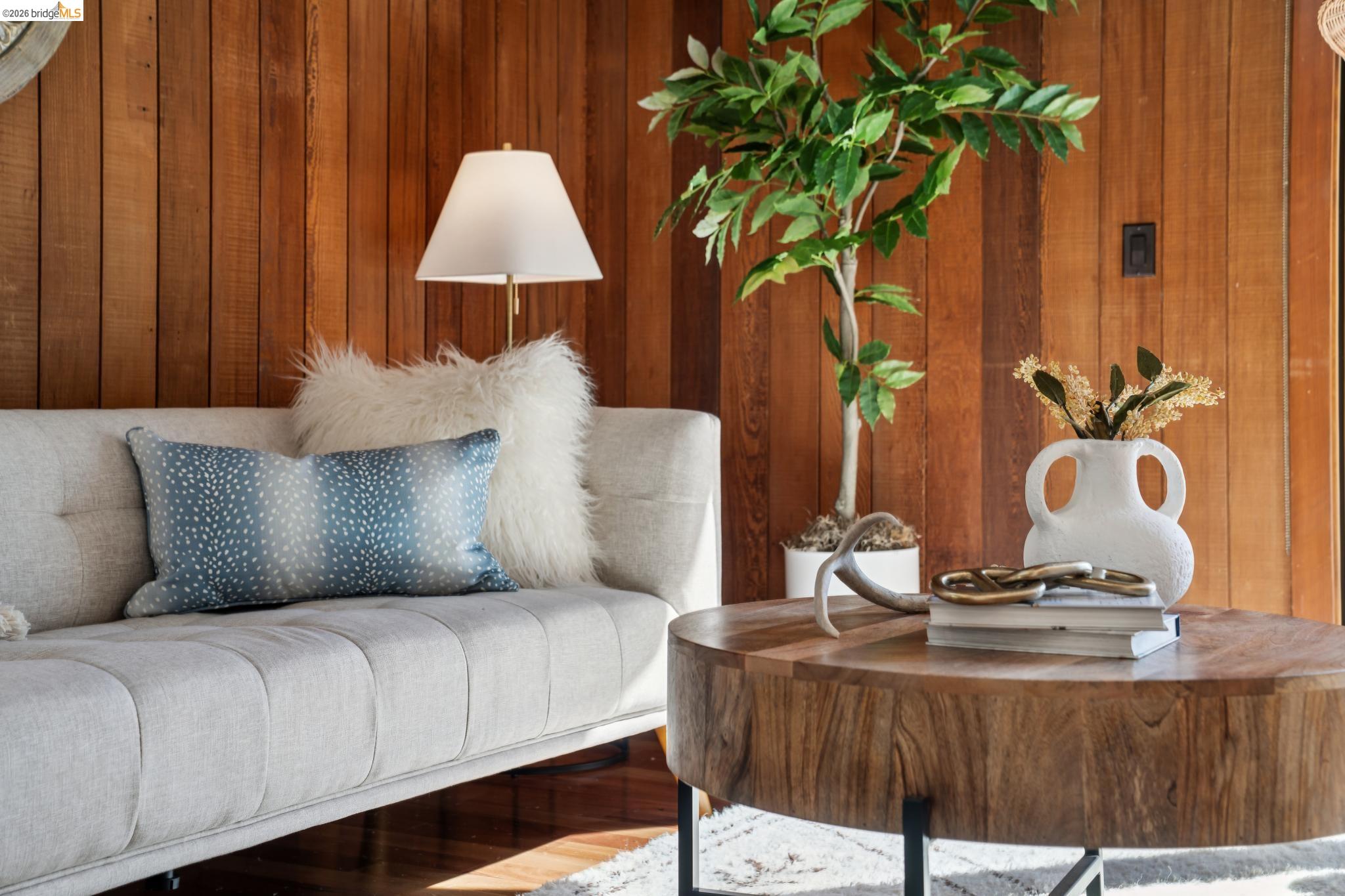 1183 Keeler Avenue Berkeley, CA 94708 - Photo 10 of 53 Sitting room featuring wooden walls and wood finished floors