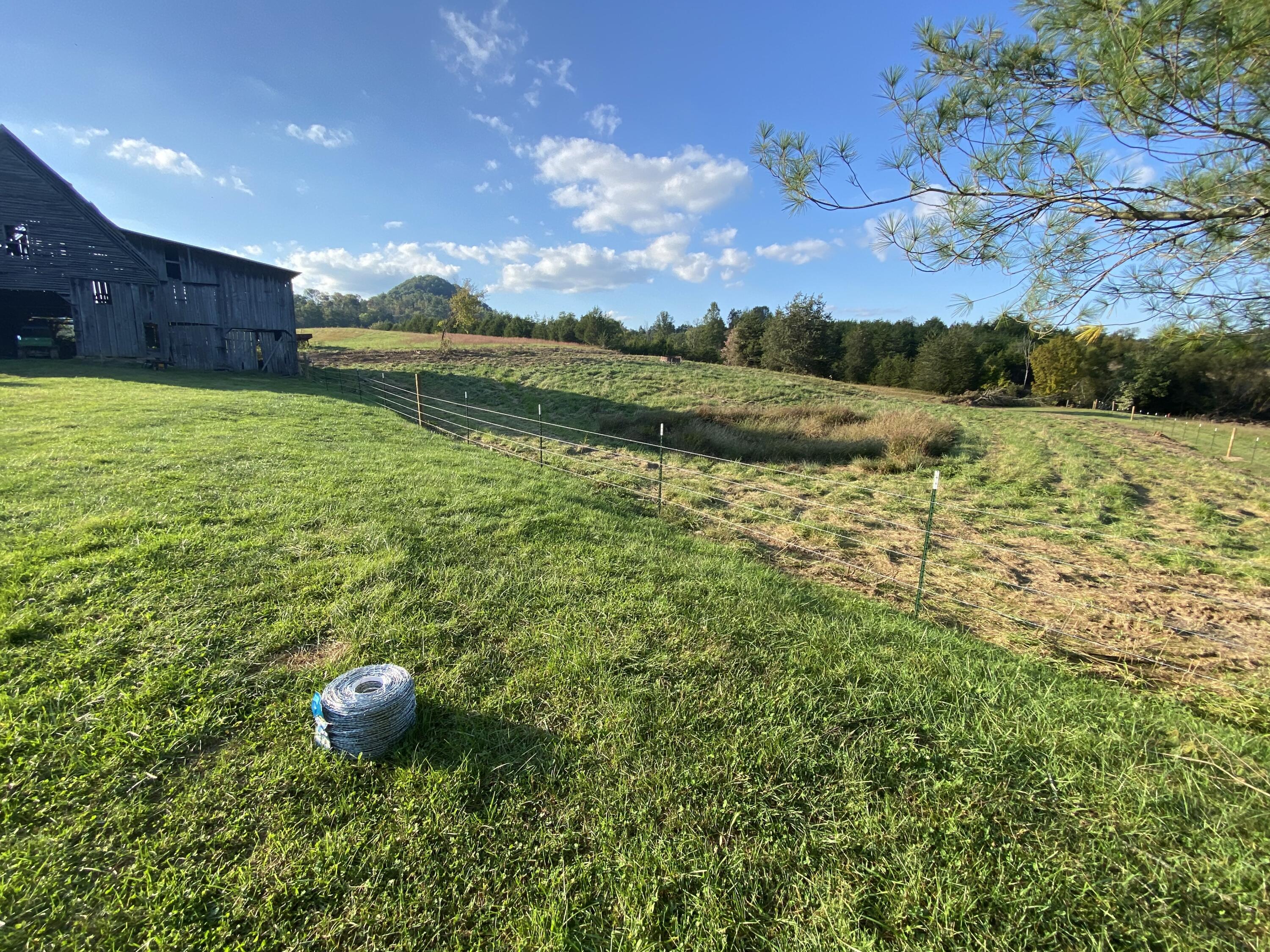 3444 Willow Tree Road Ewing, VA 24248 - Photo 40 of 40 New fencing being installed