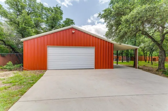 a view of backyard with green space