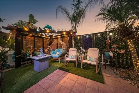 a view of a building in a backyard