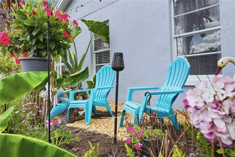 a view of a backyard of the house