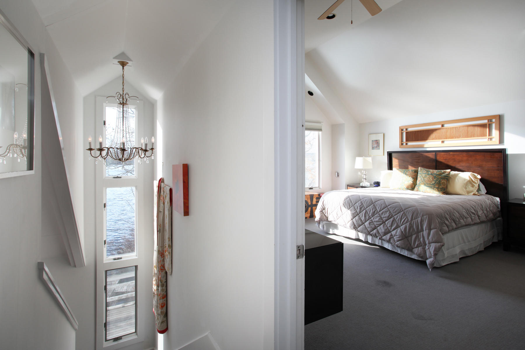 150 Holly Point Road Centerville, MA 02632 - Photo 14 of 28 a bedroom with a bed and a mirror