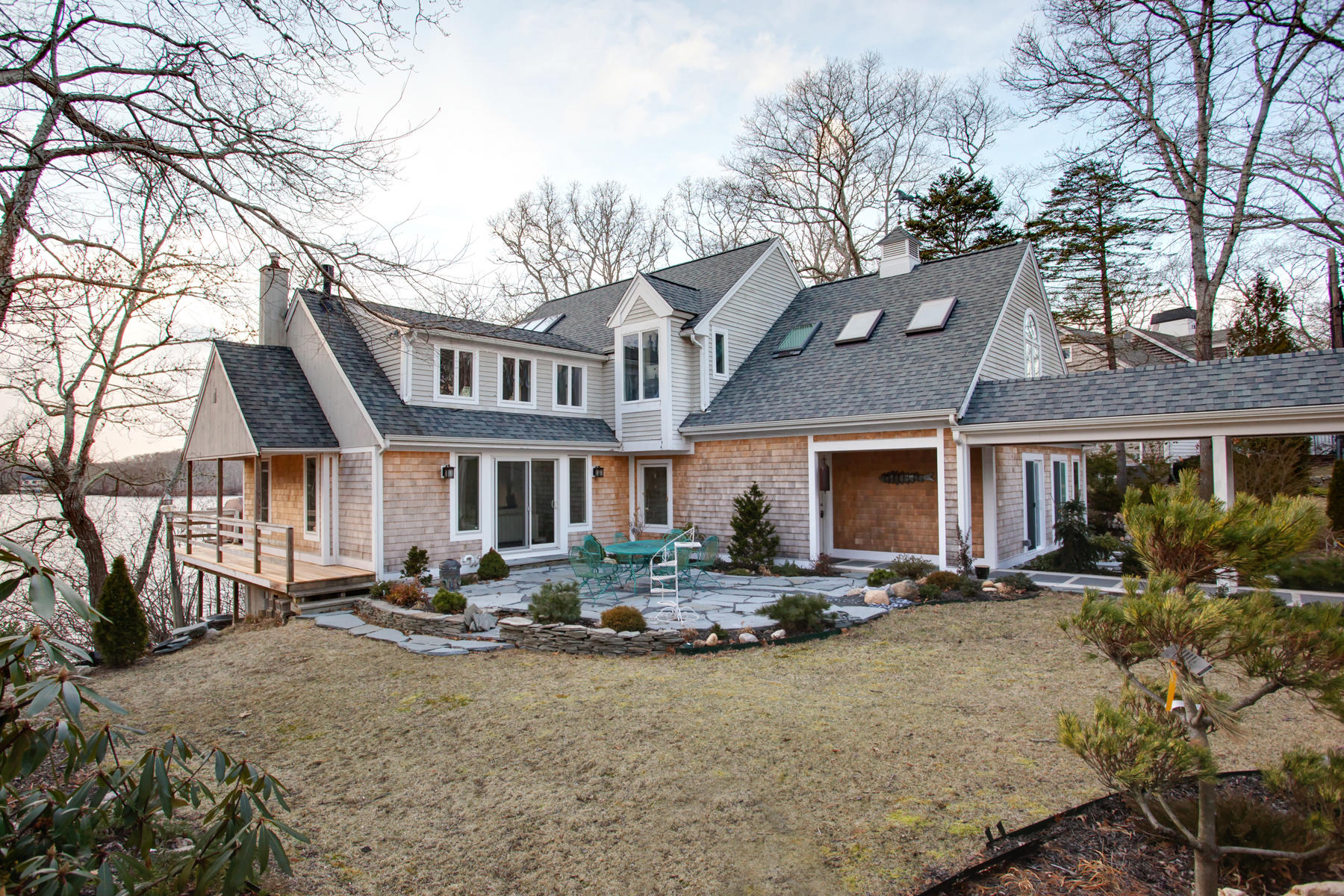 150 Holly Point Road Centerville, MA 02632 - Photo 3 of 28 a front view of house with yard outdoor seating
