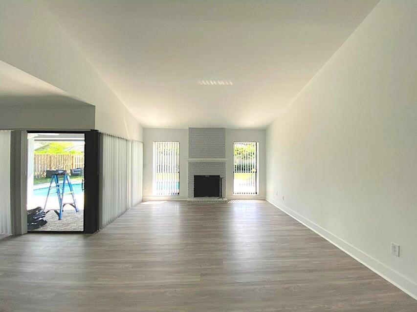 3048 Northwest 27th Terrace Boca Raton, FL 33434 - Photo 4 of 10 fireplace