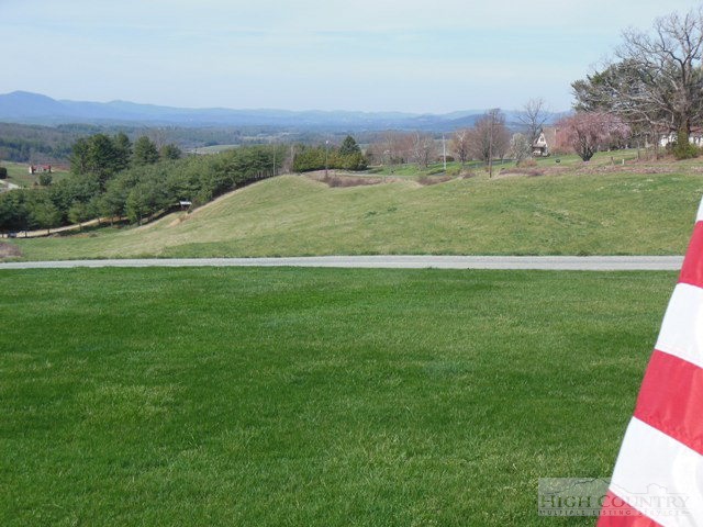 1242 Lazy Branch Road Ennice, NC 28623 - Photo 3 of 29 a view of a field with an ocean