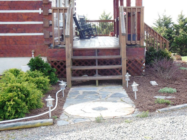 1242 Lazy Branch Road Ennice, NC 28623 - Photo 8 of 29 a view of a porch