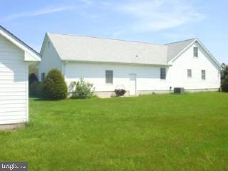 35205 Poplar Neck Road Pittsville, MD 21850 - Photo 2 of 12 a view of an house with backyard space and garden