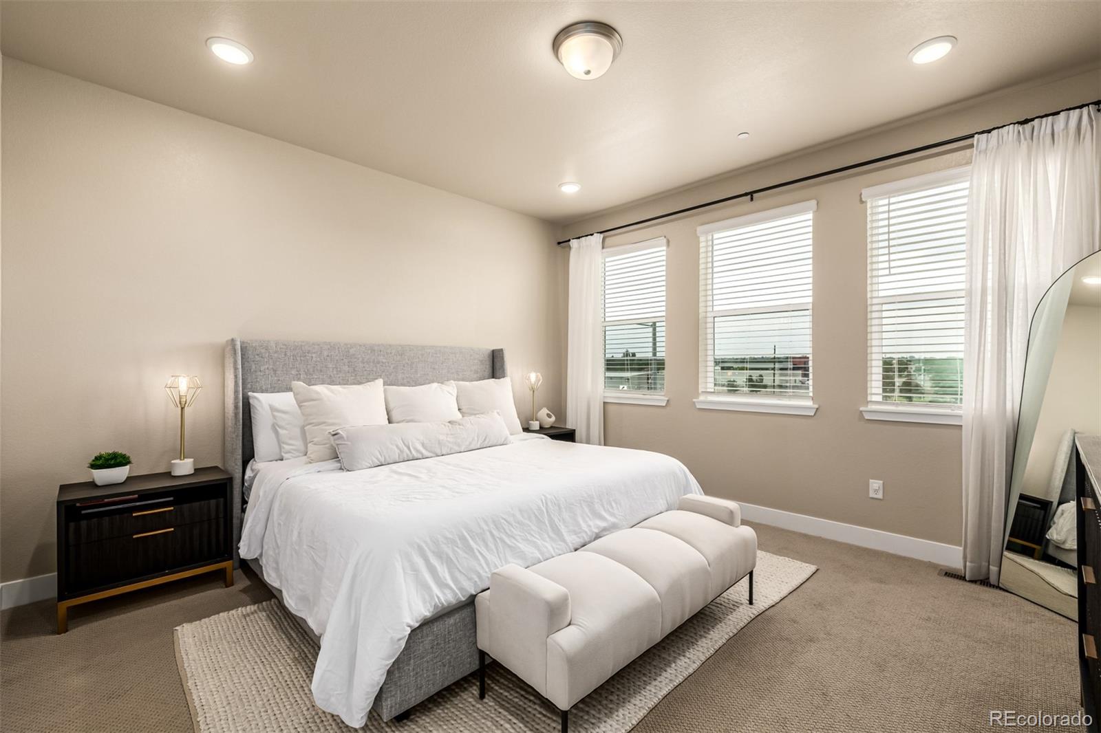 1575 West 68th Avenue Denver, CO 80221 - Photo 14 of 39 a bedroom with a bed and a window