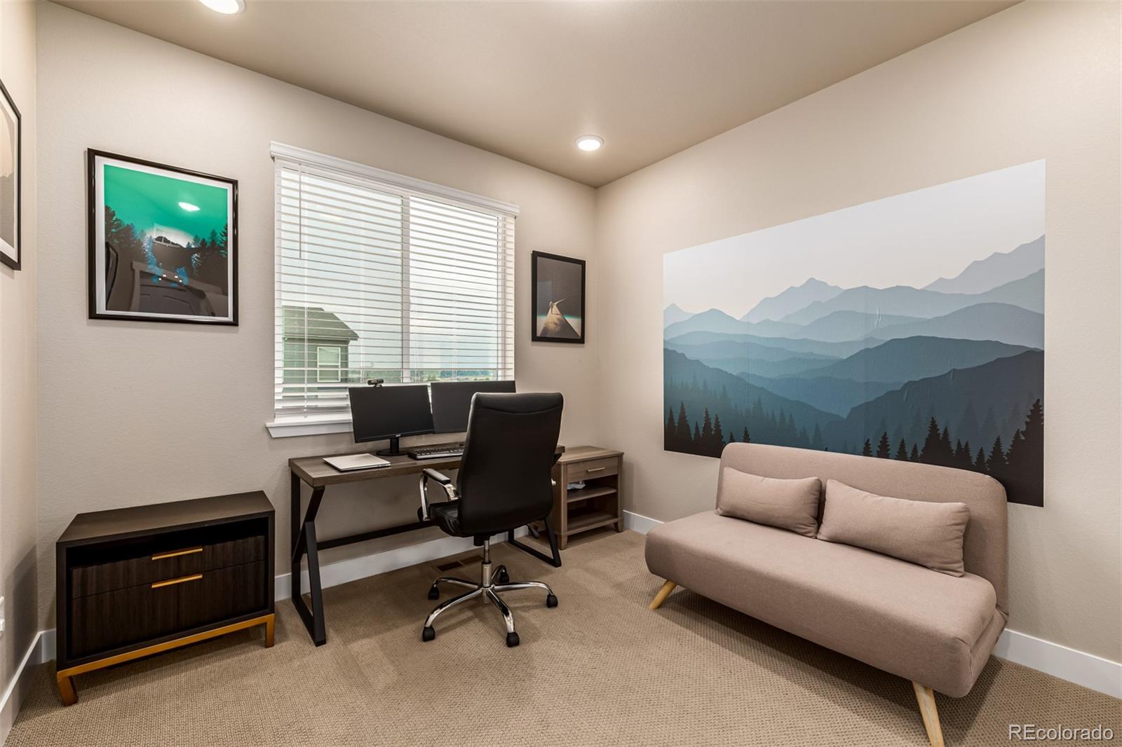 1575 West 68th Avenue Denver, CO 80221 - Photo 22 of 39 a view of a livingroom with workspace and a couch