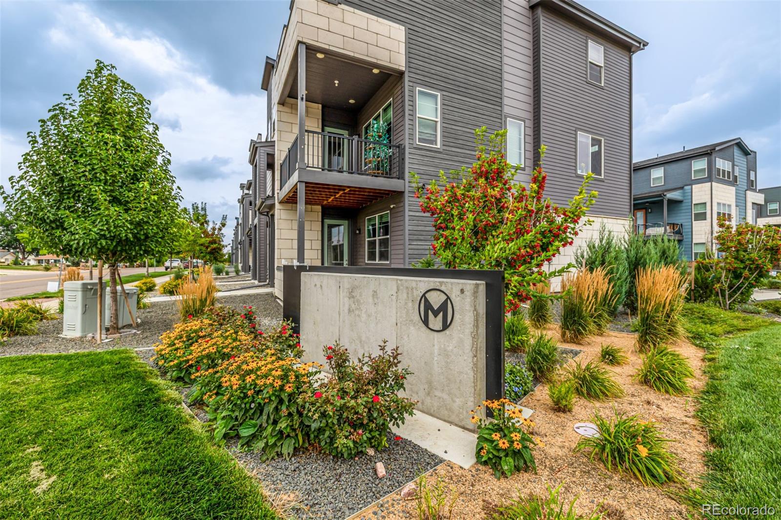 1575 West 68th Avenue Denver, CO 80221 - Photo 32 of 39 a sign that is on the side of a building