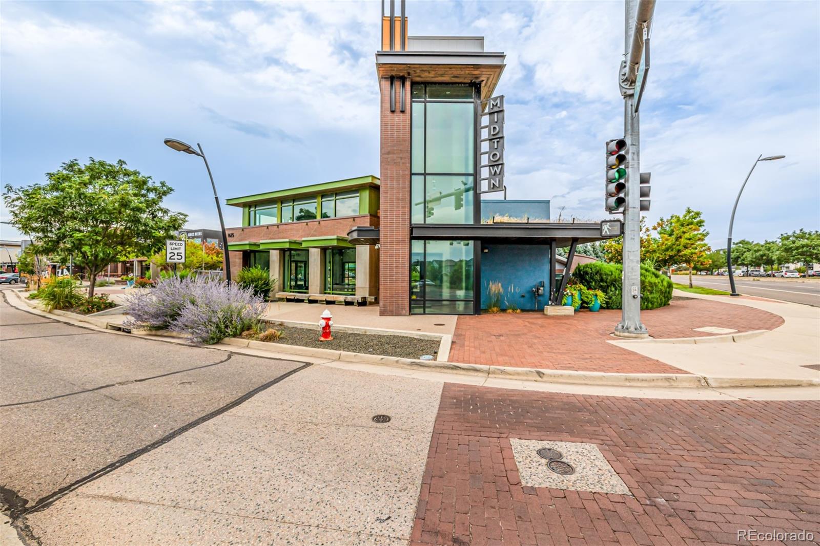 1575 West 68th Avenue Denver, CO 80221 - Photo 35 of 39 a front view of a building with street