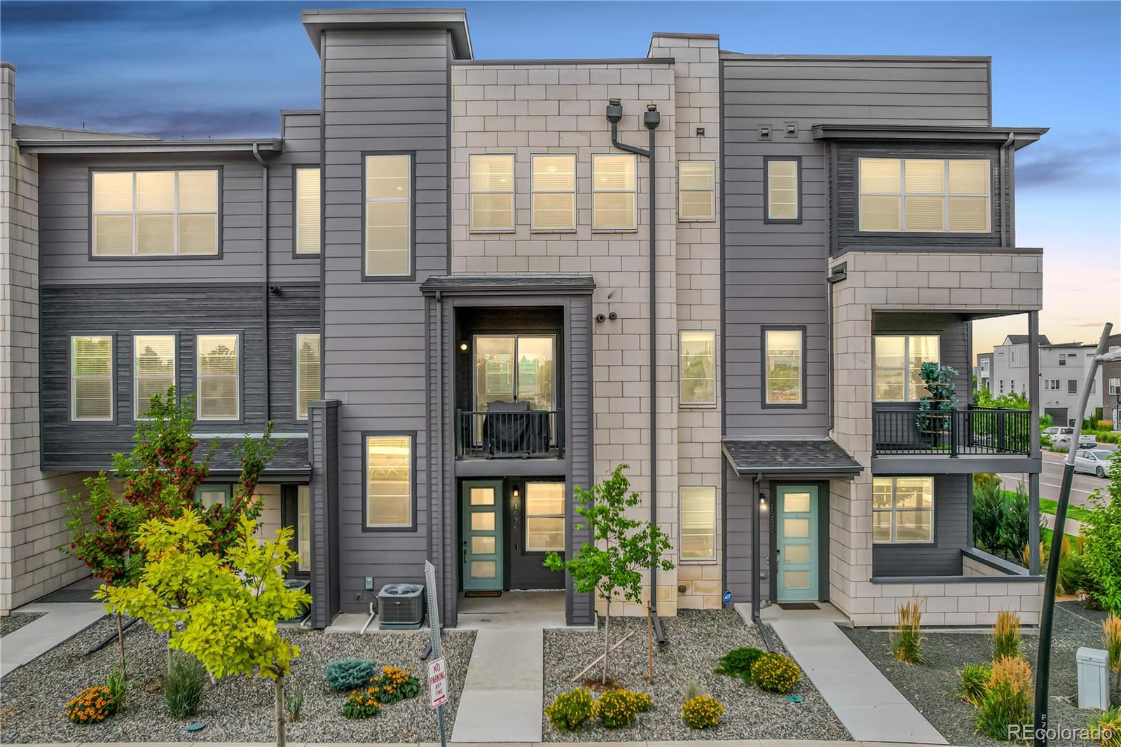 1575 West 68th Avenue Denver, CO 80221 - Photo 38 of 39 a front view of a house having yard