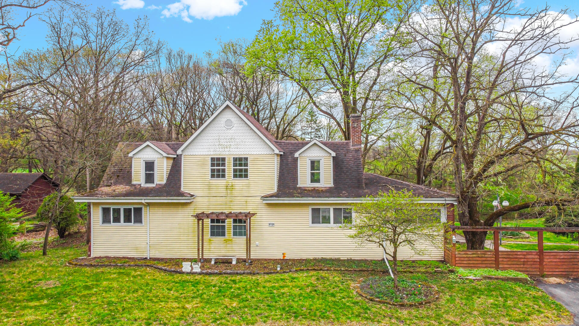 3721 West 133rd Avenue Crown Point, IN 46307 - Photo 1 of 30 a view of a yard in front of house